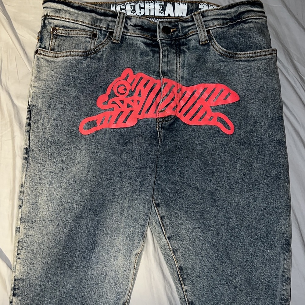 Pink running dog BBC ICECREAM jeans.